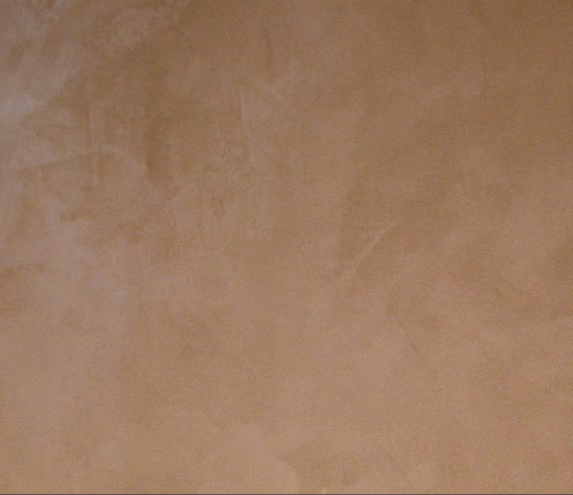 Polished Cemher Microtadelakt lime plaster surface with a soft mottled sheen