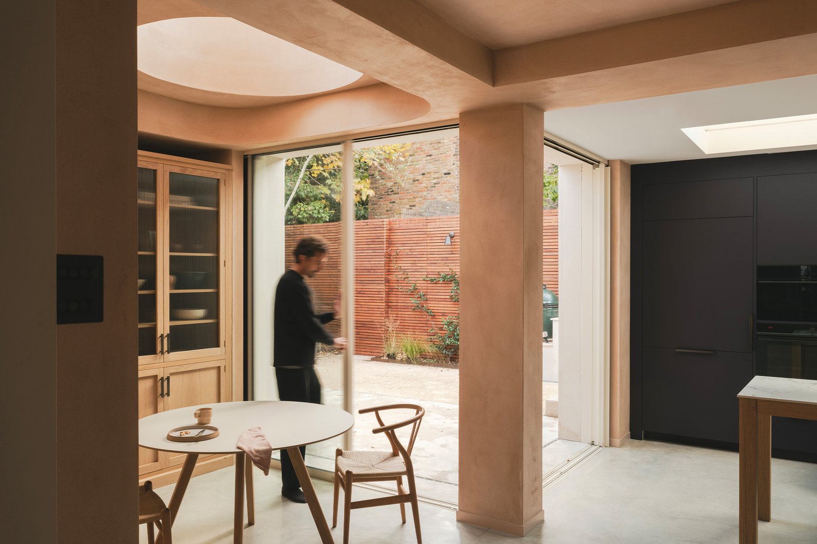 Smooth clay plaster at Balmore House, London, in an earthy nude tone.
