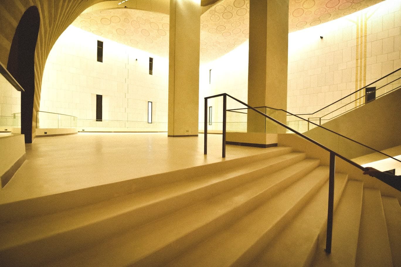 Wide beige seamless-finished steps and landing, King Fahad Cultural Centre, Riyadh
