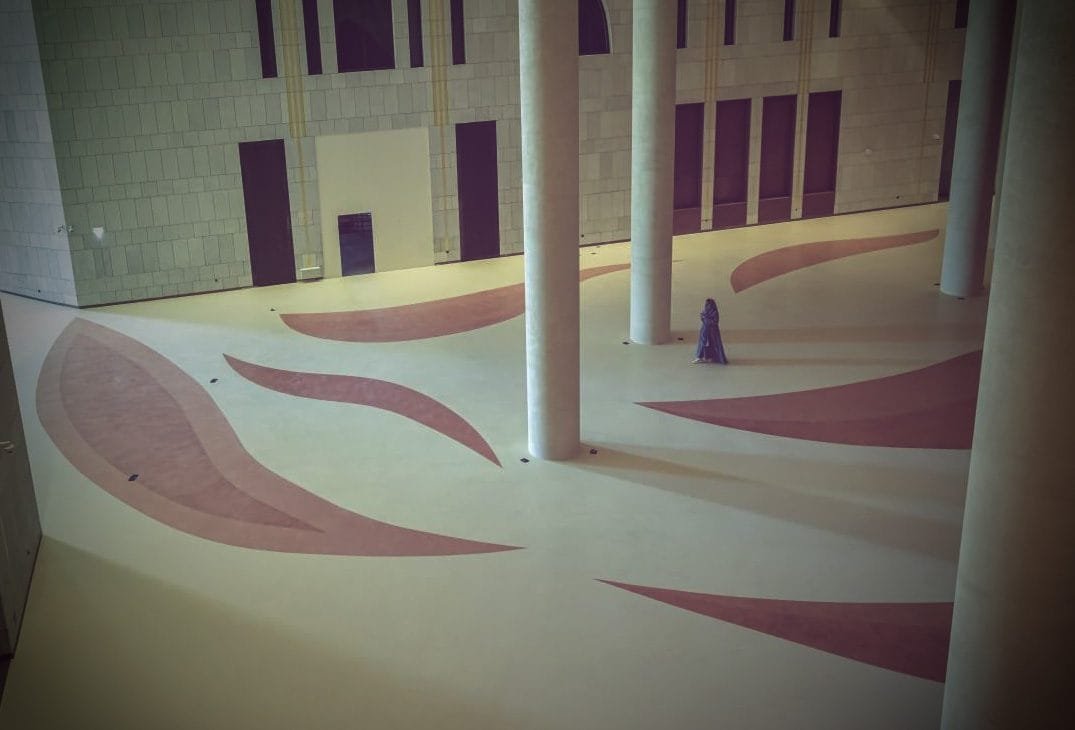 Grand hall at King Fahad Cultural Centre, Riyadh, with leaf inlays set into a cream Microdur Plus microcement floor