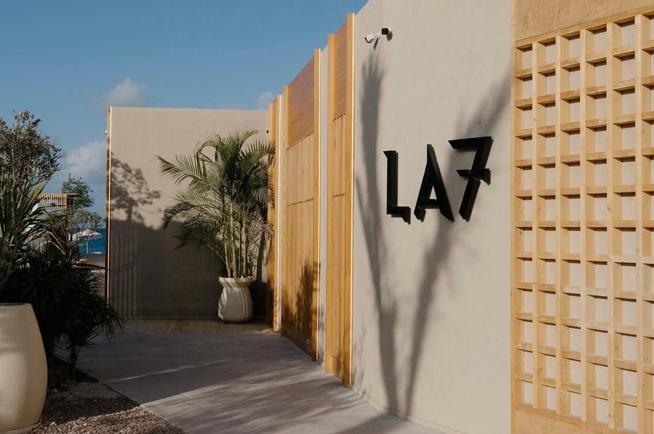 Sand-toned microcement entrance wall at LA7 Wellness Beach Club, Egypt